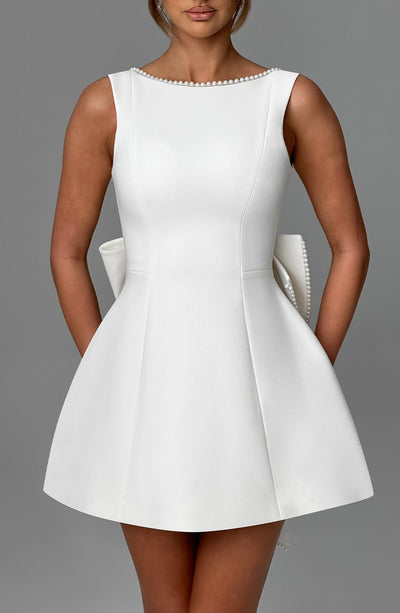 Hollis - Elegant Pearl Bow Mini Dress