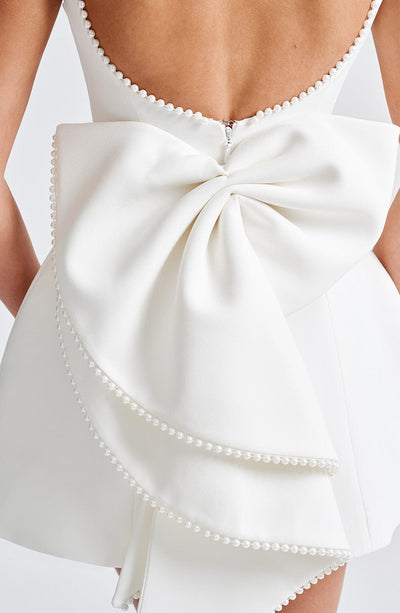 Hollis - Elegant Pearl Bow Mini Dress